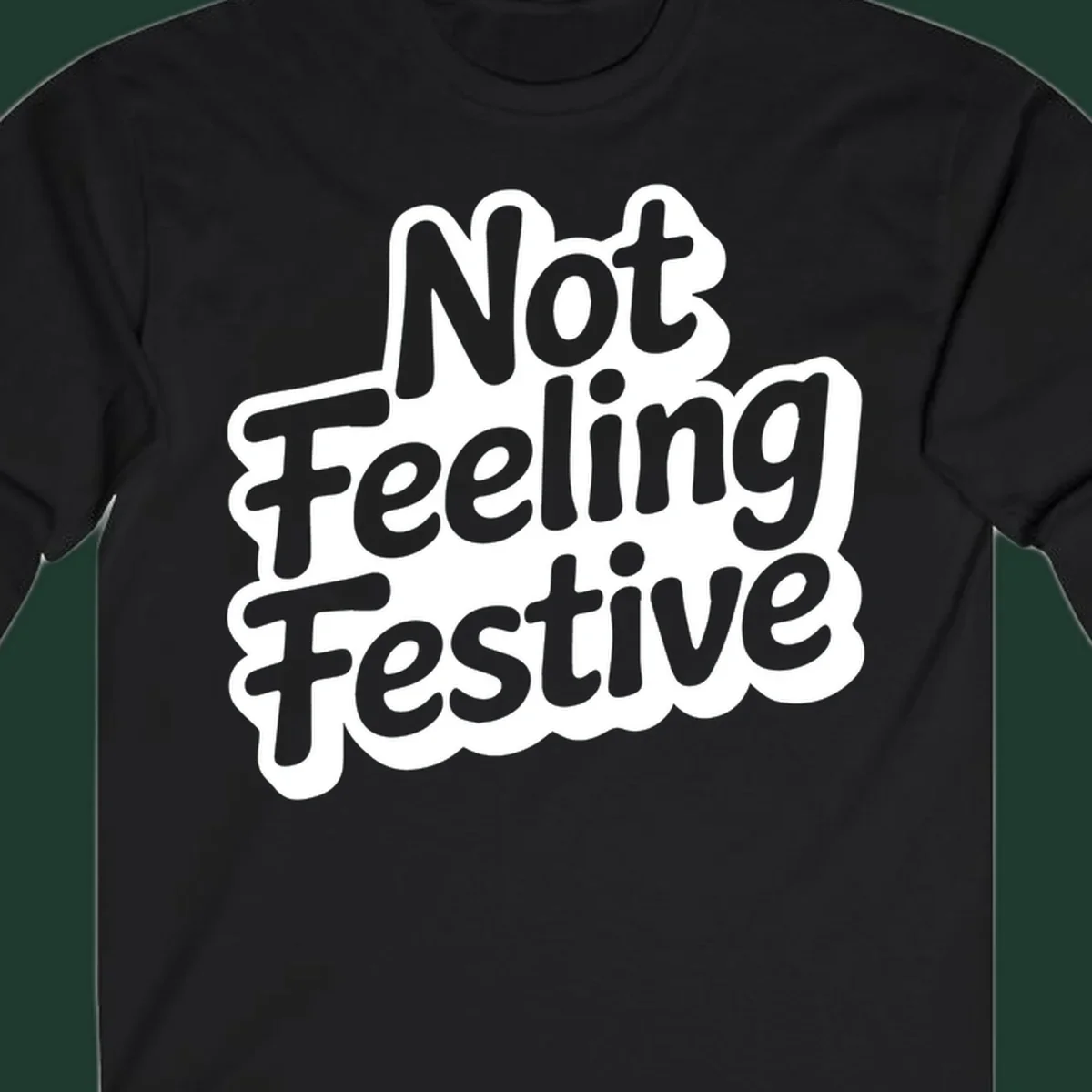 Not Feeling Festive typography design with black text and white outline.