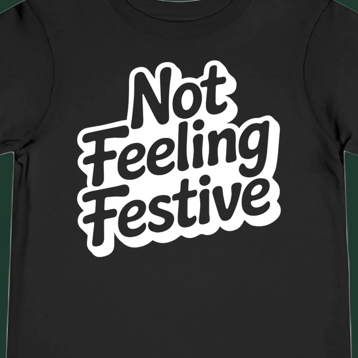 Not Feeling Festive typography design with black text and white outline.