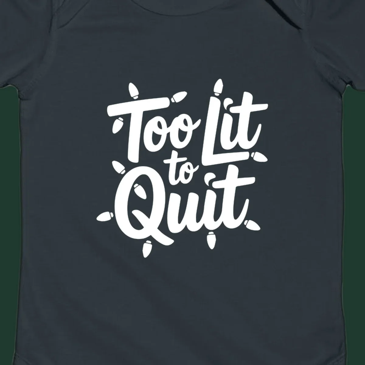 Typography design with "Too lit to quit" phrase and Christmas lights border. Too-lit-to-quit concept.