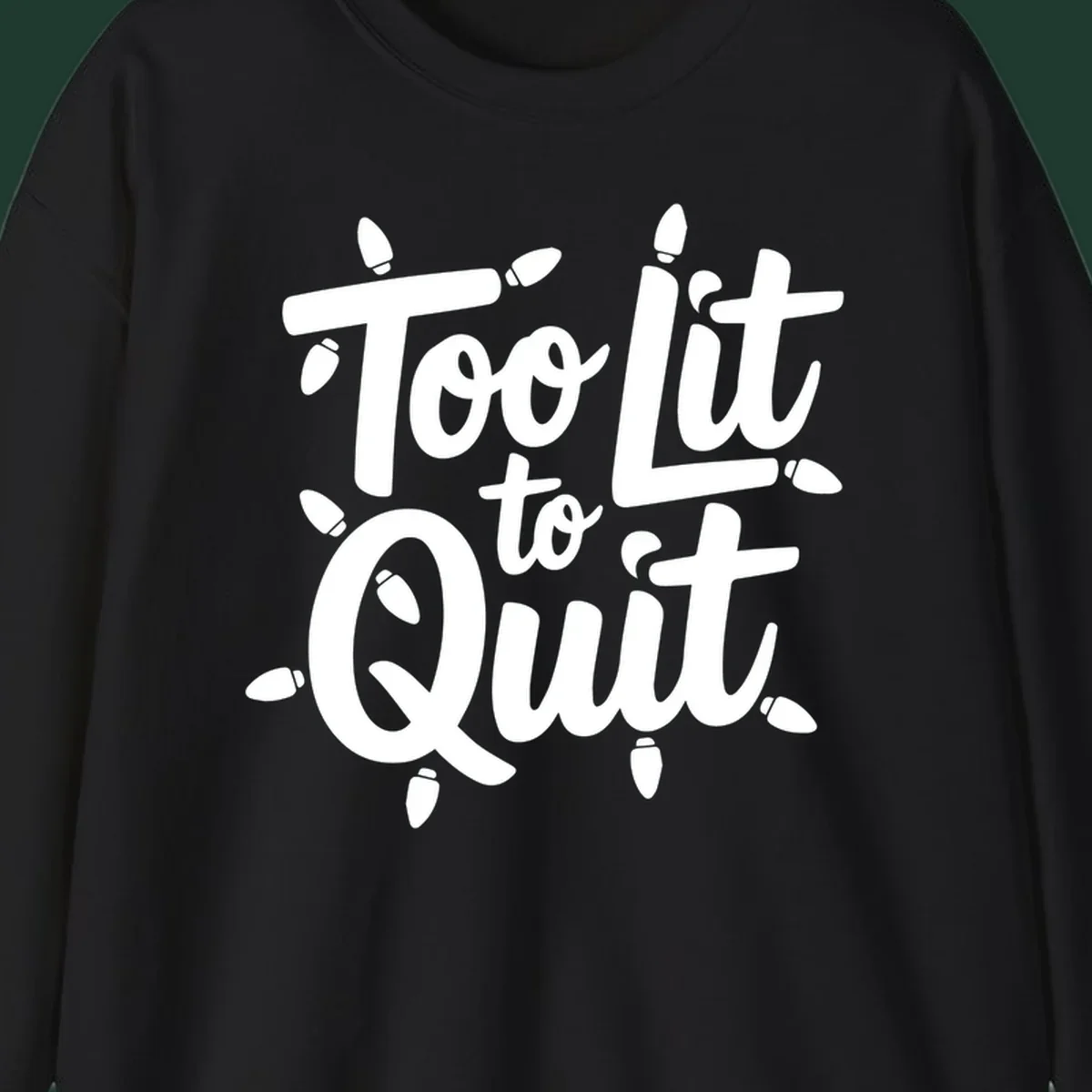 Typography design with "Too lit to quit" phrase and Christmas lights border. Too-lit-to-quit concept.