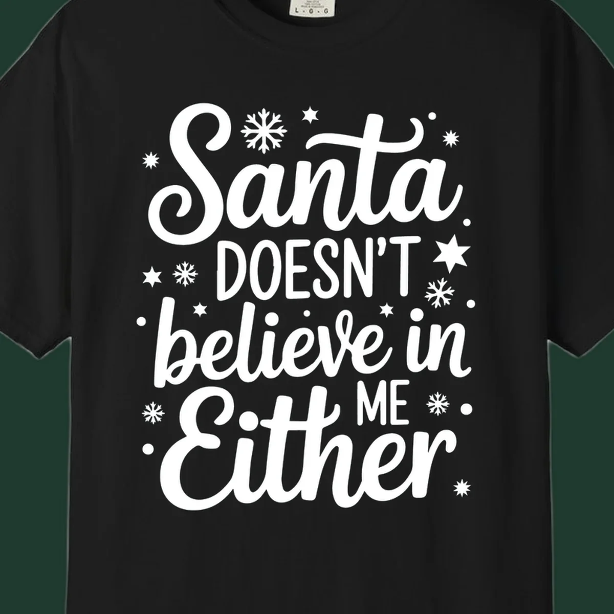 Typography design that reads Santa DOESN'T believe in ME Either, with snowflakes and stars.