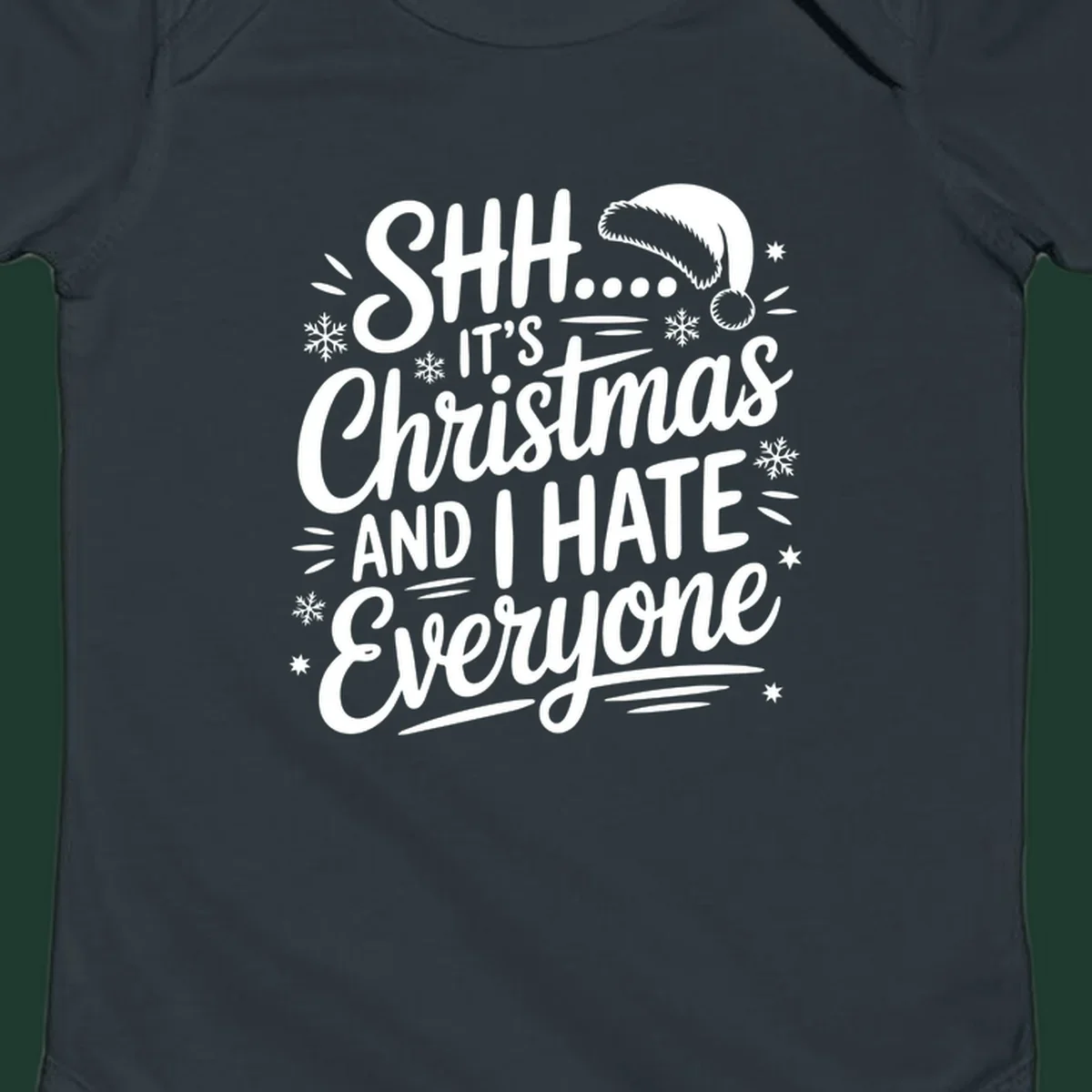 Shh it's Christmas And I Hate Everyone typography with Santa hat, snowflakes, and stars.