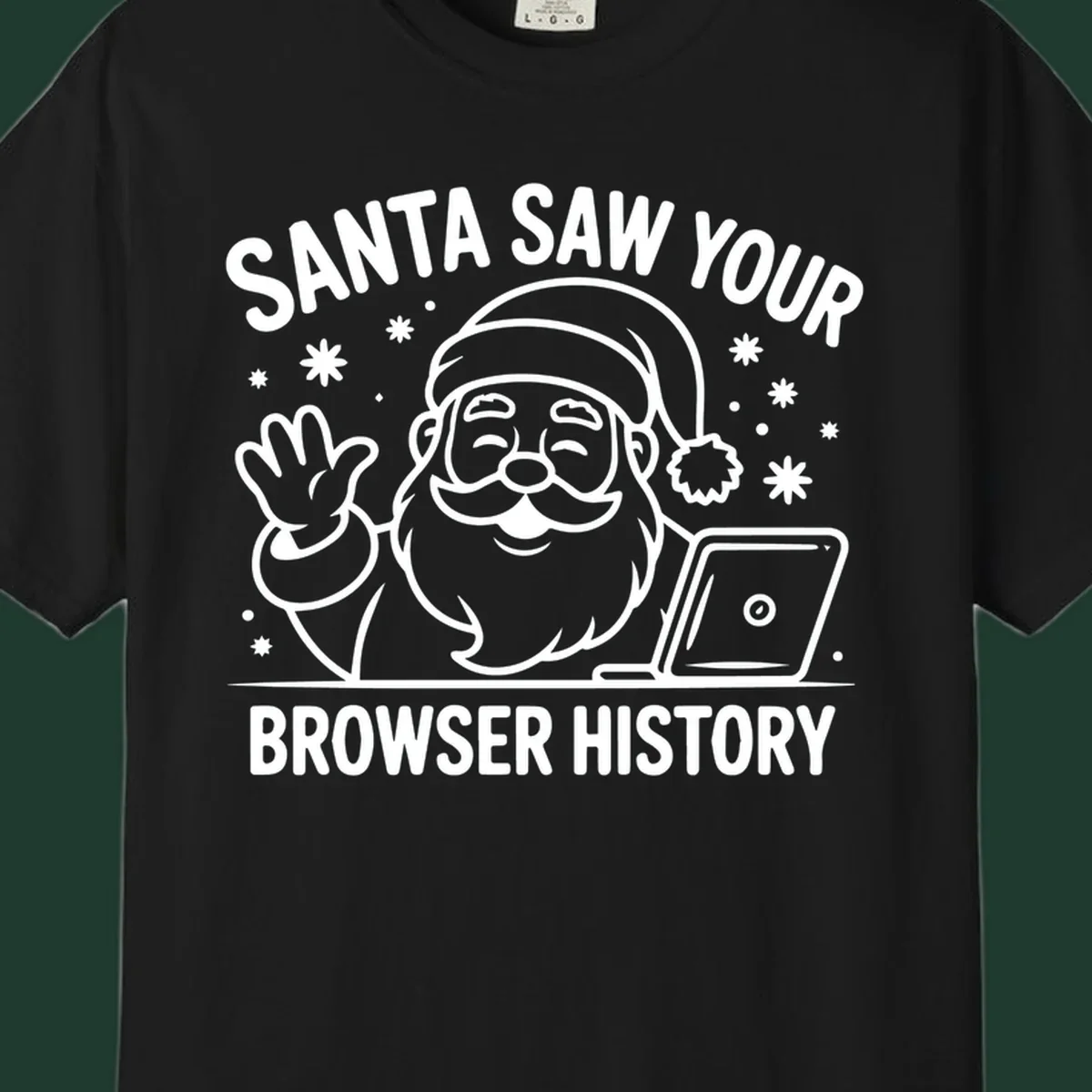 Santa Claus at a laptop with text "SANTA SAW YOUR BROWSER HISTORY"
