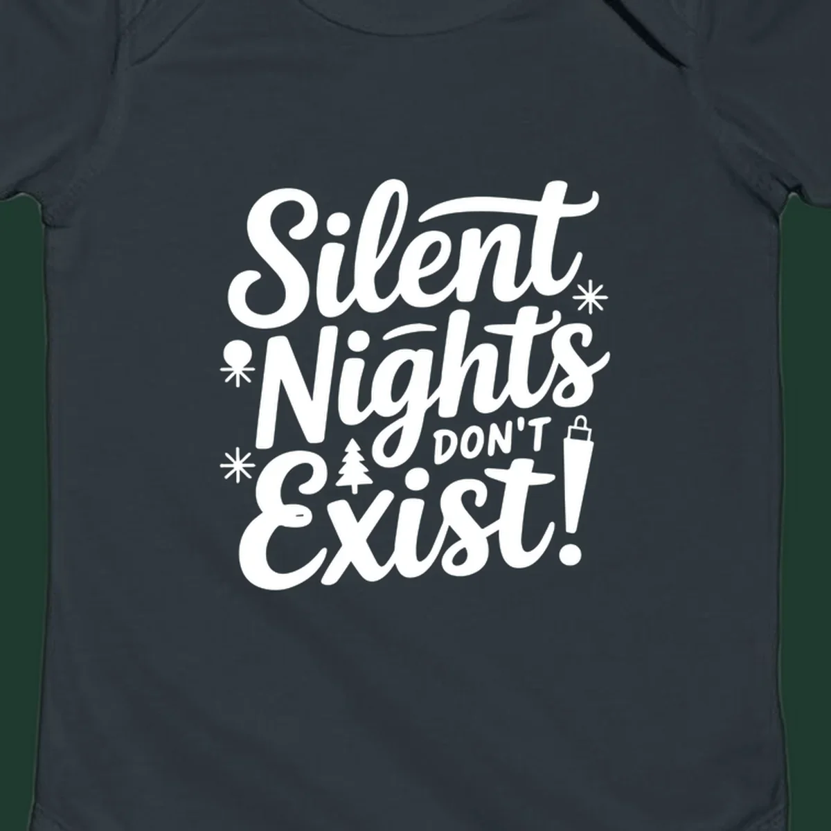 Silent Nights Don't Exist typographic design with Christmas elements.