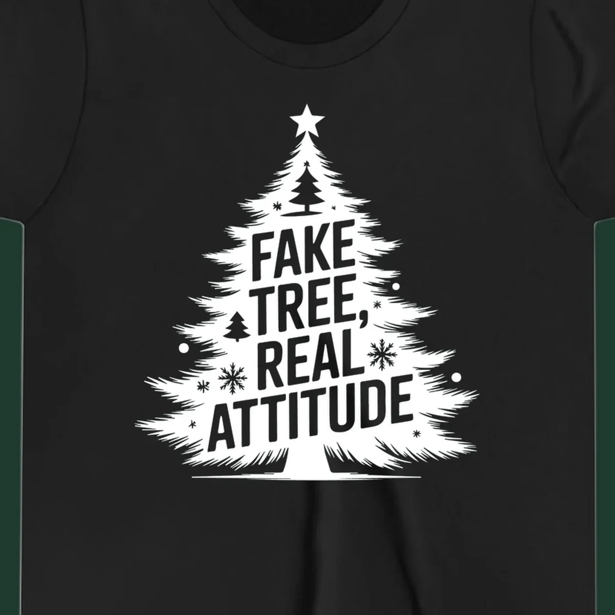 Christmas tree graphic with text 'FAKE TREE, REAL ATTITUDE' and snowflake accents.
