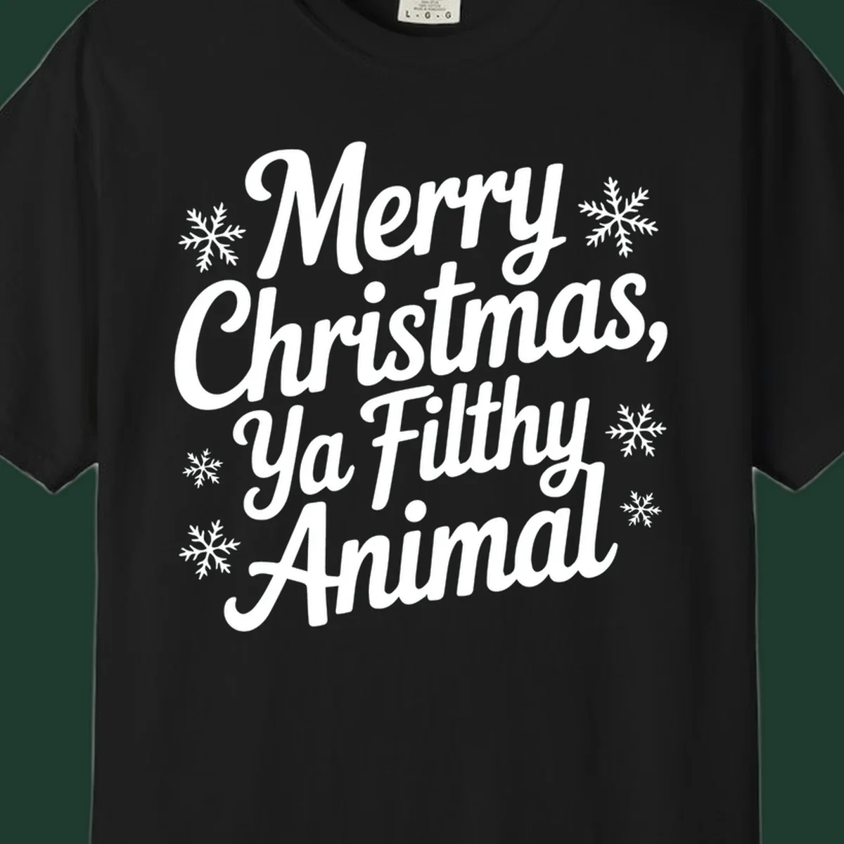 Merry Christmas Ya Filthy Animal typography with snowflakes.