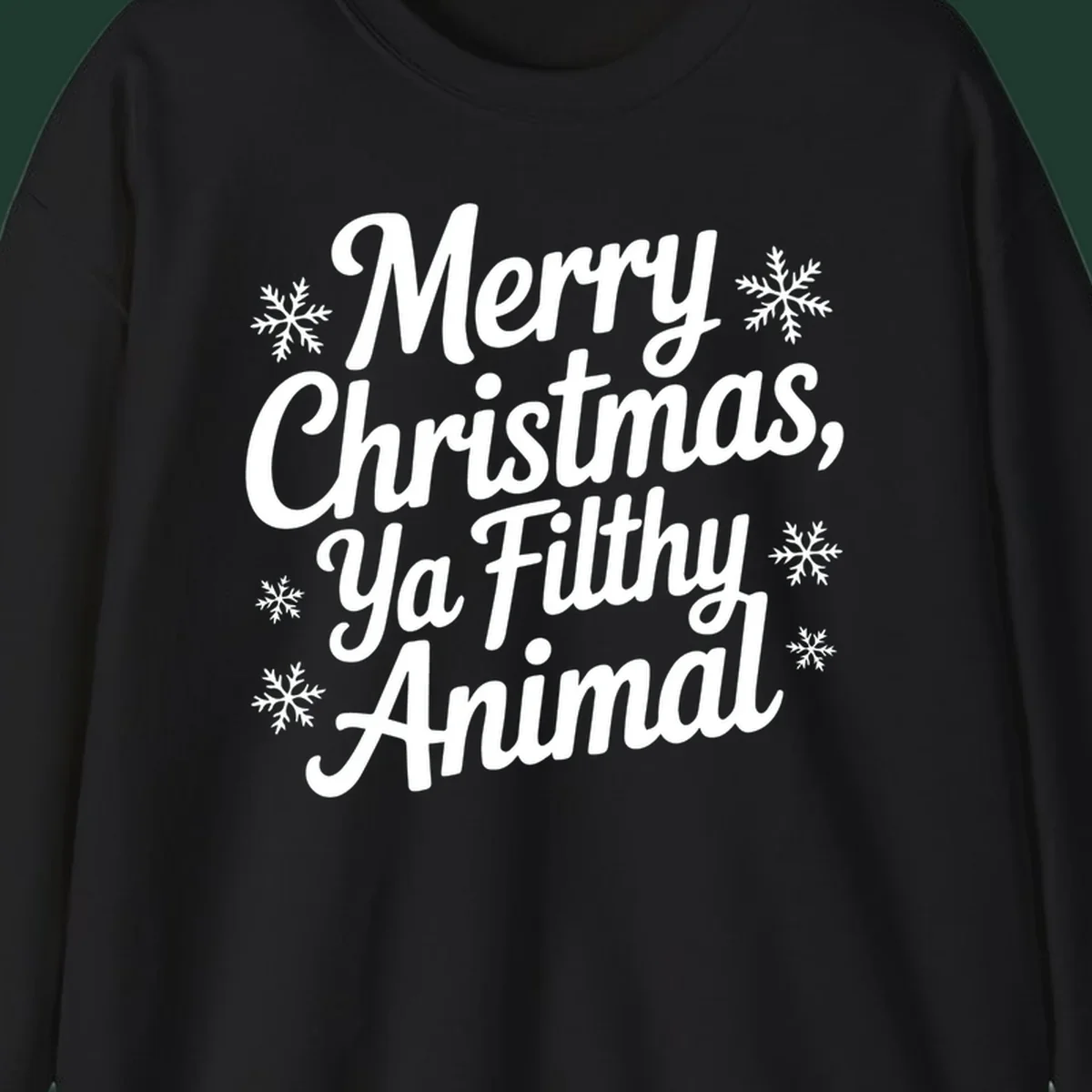 Merry Christmas Ya Filthy Animal typography with snowflakes.