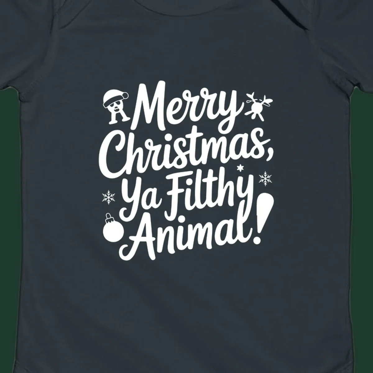 Merry Christmas Ya Filthy Animal quote with festive graphic elements.