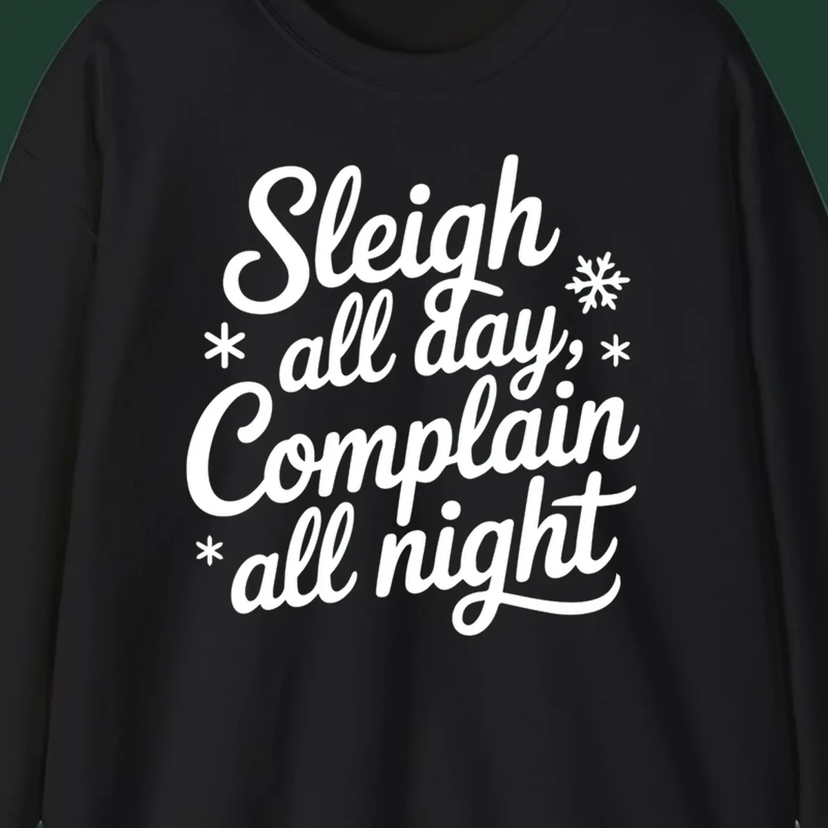 White typography reading 'Sleigh all day, Complain all night' with snowflakes and asterisks. sleigh-all-day.