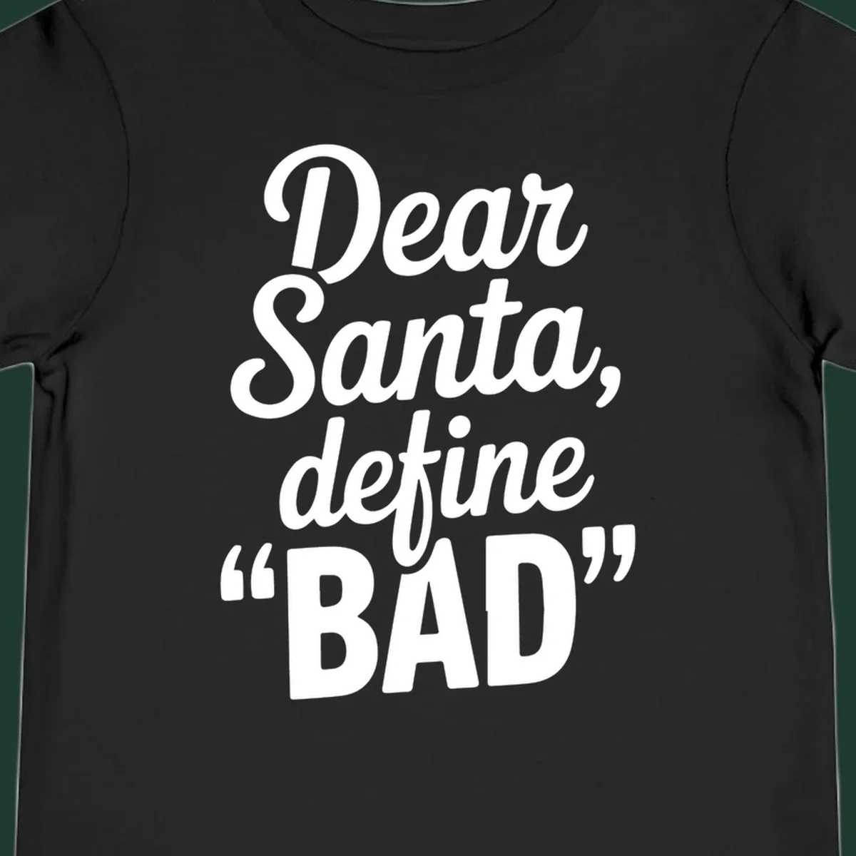 Dear Santa Define Bad typography in white script on black.