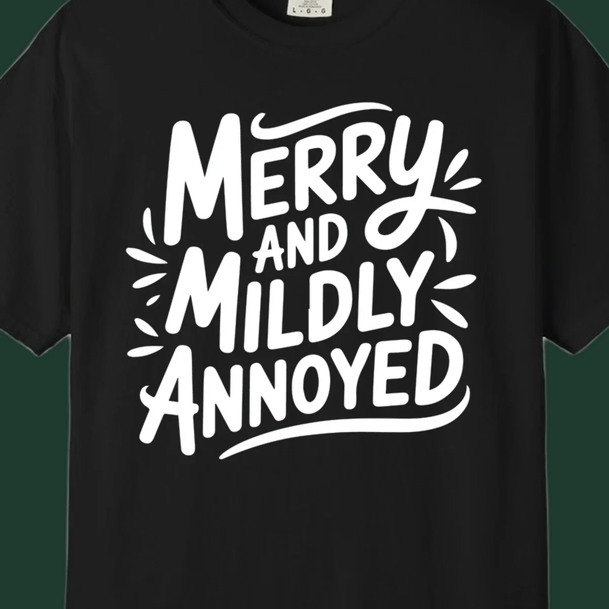 Merry And Mildly Annoyed text graphic. White hand-drawn lettering on dark background.