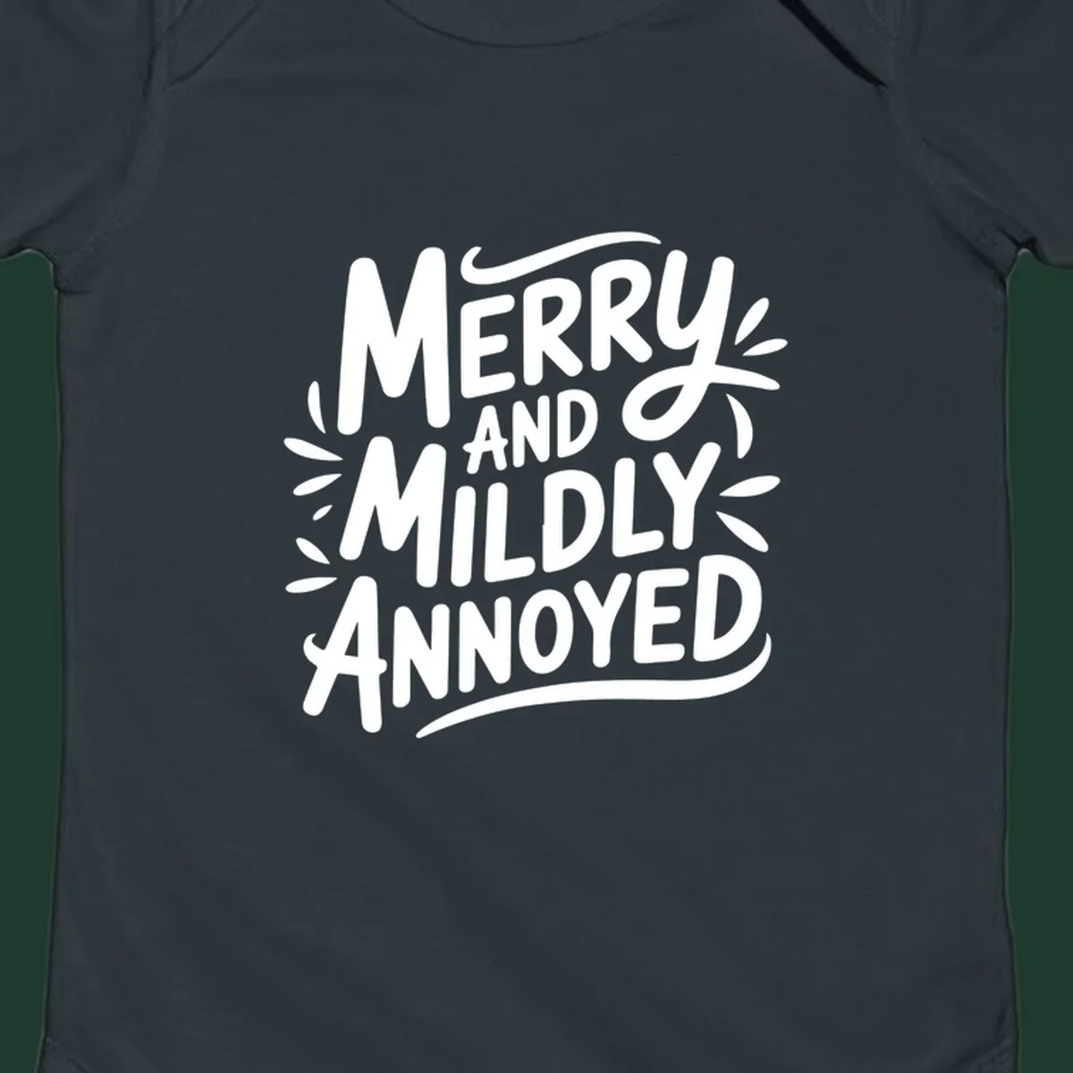 Merry And Mildly Annoyed text graphic. White hand-drawn lettering on dark background.