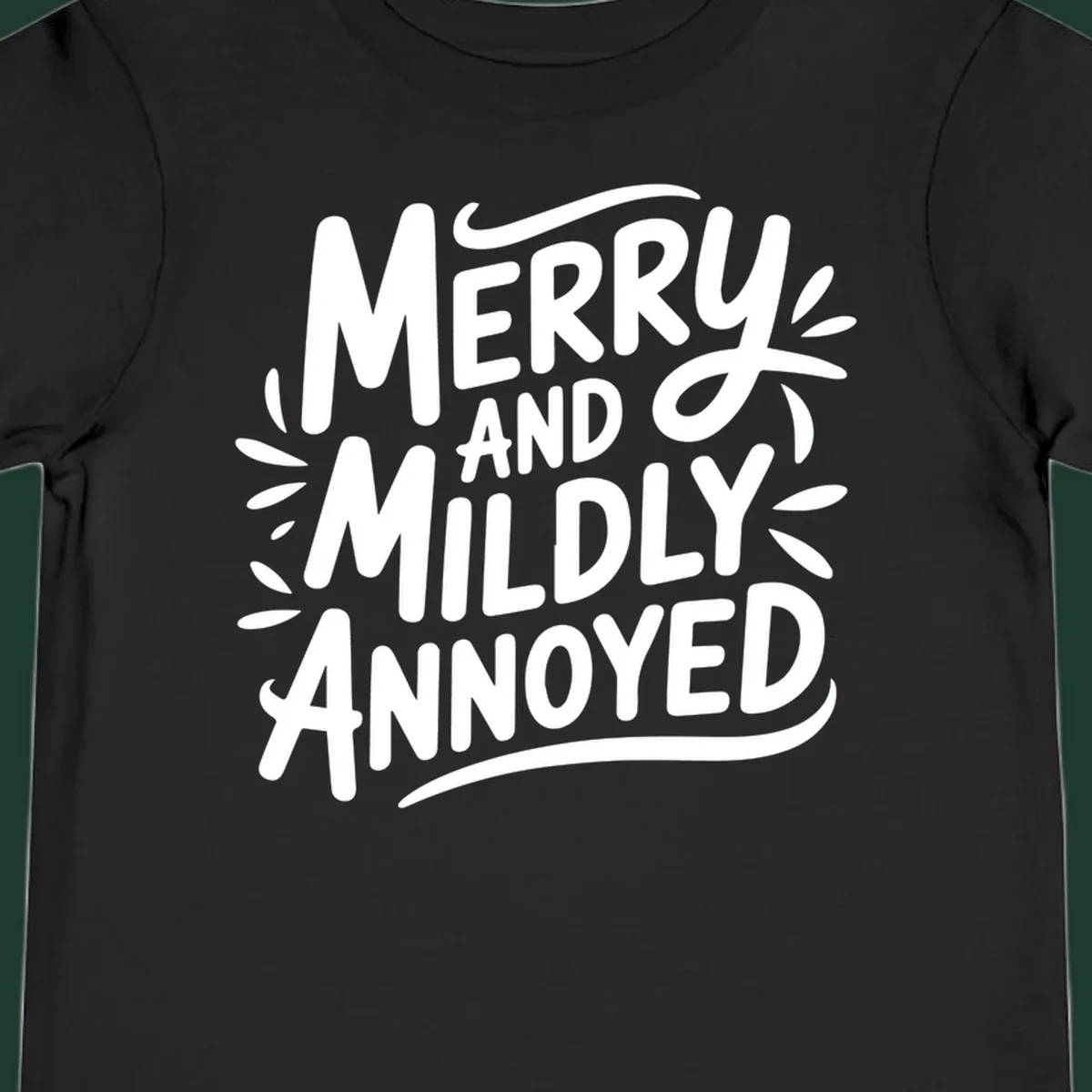 Merry And Mildly Annoyed text graphic. White hand-drawn lettering on dark background.