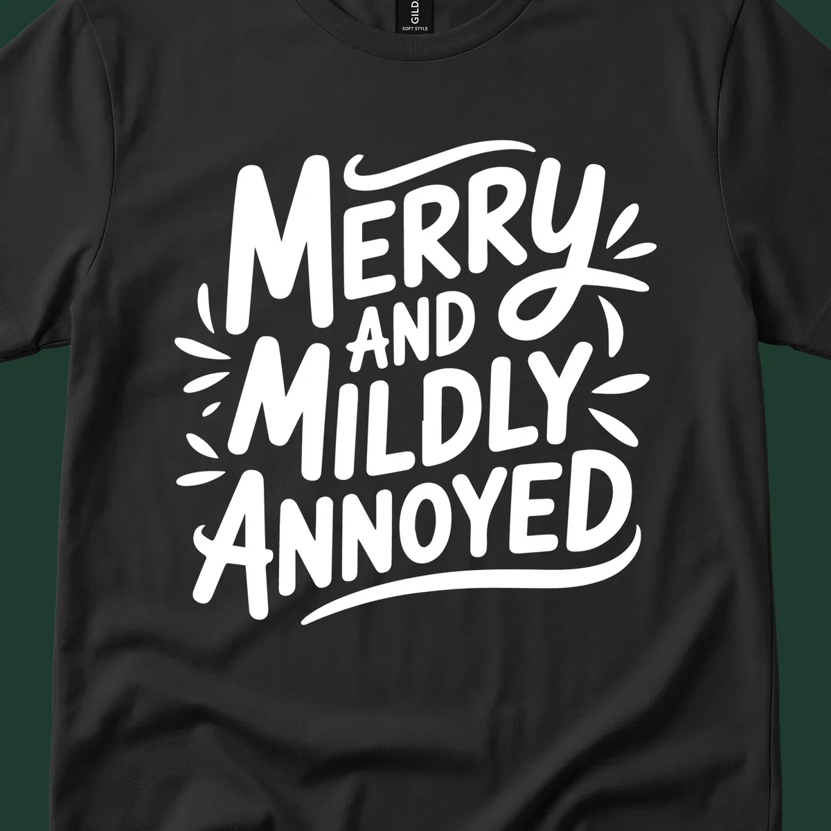 Merry And Mildly Annoyed text graphic. White hand-drawn lettering on dark background.