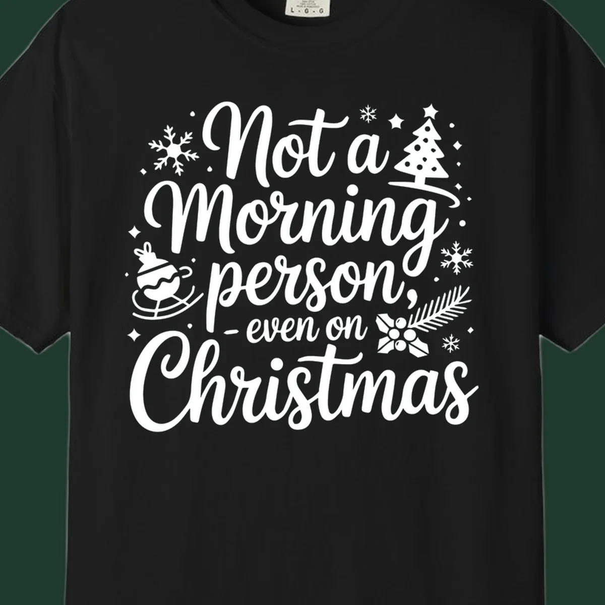 White typography on black background reads 'Not a Morning Person Christmas' with holiday graphics.