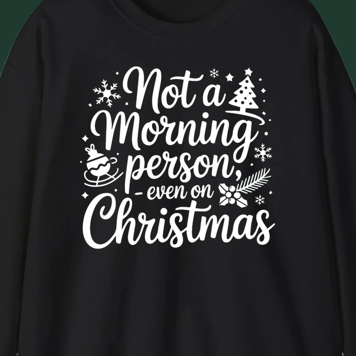 White typography on black background reads 'Not a Morning Person Christmas' with holiday graphics.