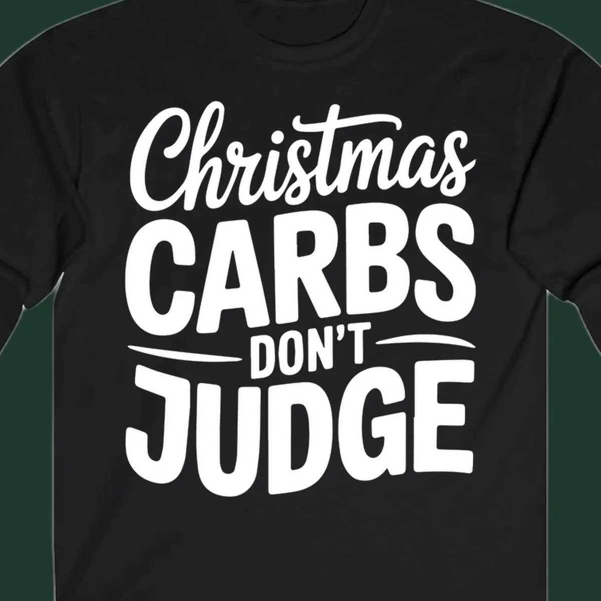 Christmas carbs don't judge phrase in white bold typography on black background.
