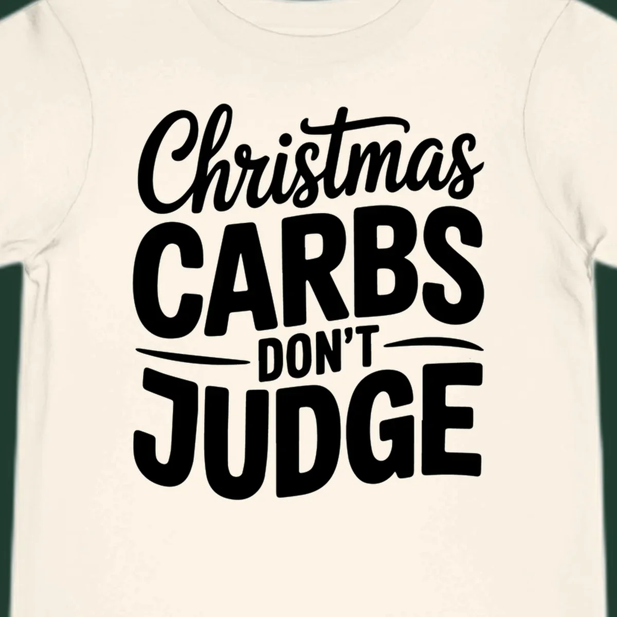 Christmas carbs don't judge phrase in white bold typography on black background.