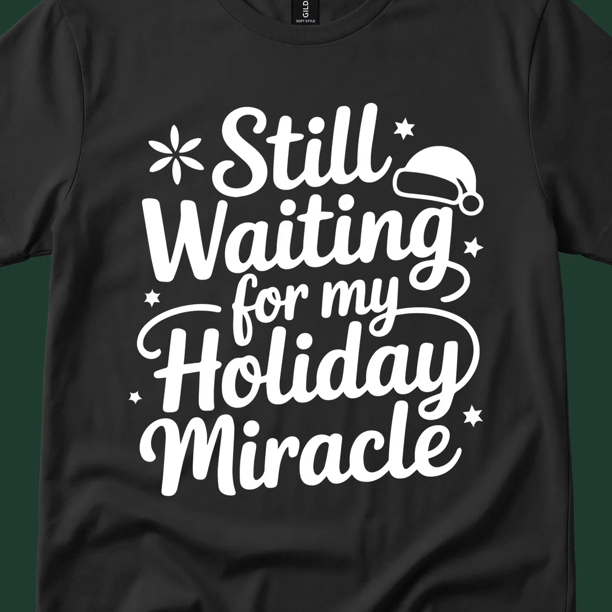 Text graphic 'Still Waiting for my Holiday Miracle' with holiday accents.