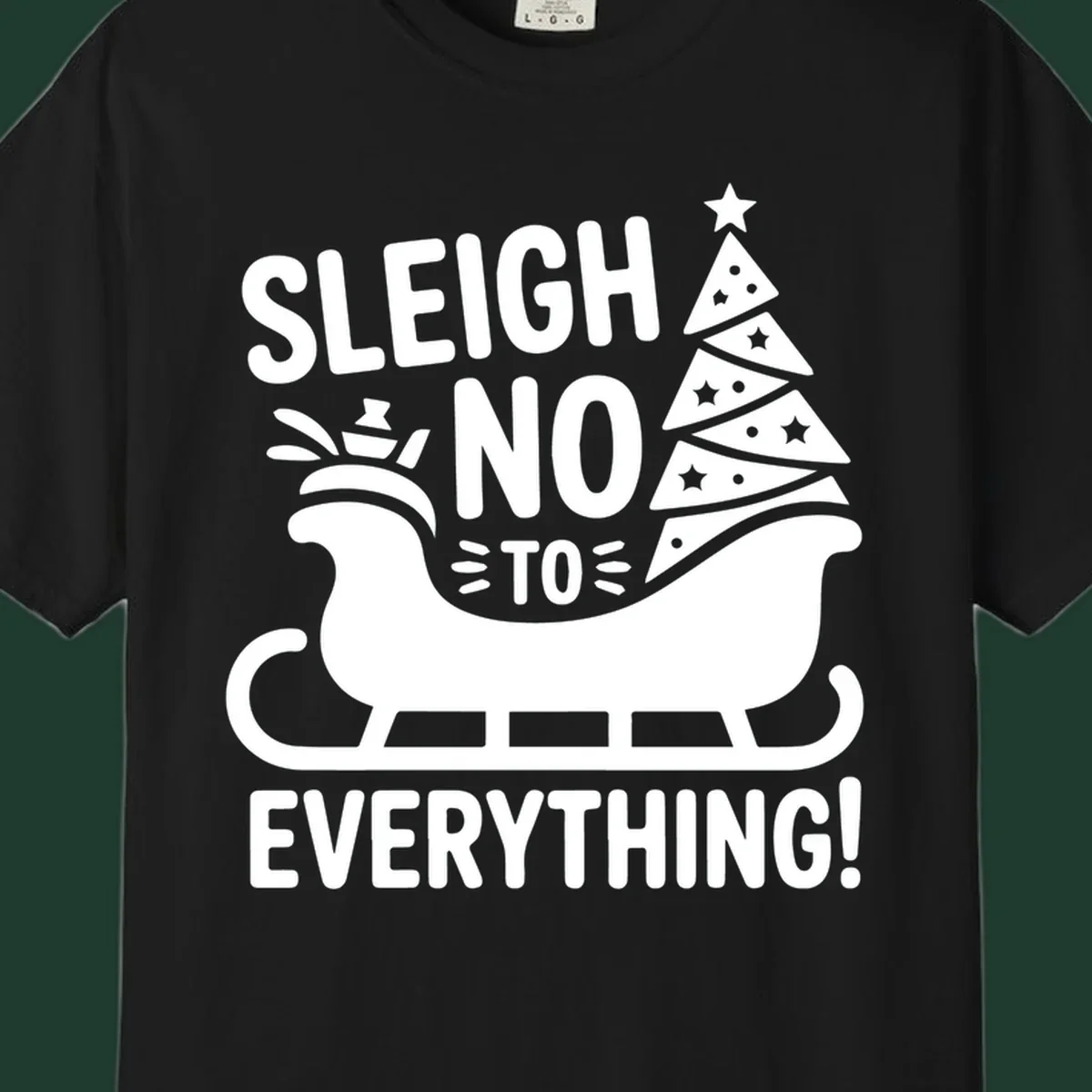 Sleigh no to everything graphic with christmas tree in sleigh.