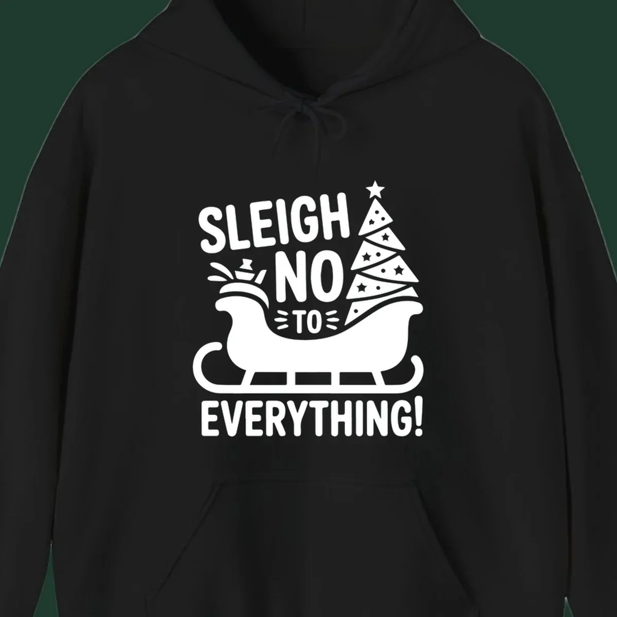Sleigh no to everything graphic with christmas tree in sleigh.