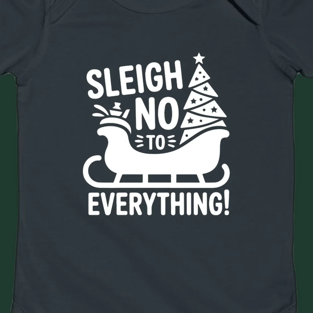 Sleigh no to everything graphic with christmas tree in sleigh.