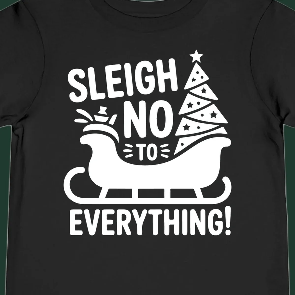 Sleigh no to everything graphic with christmas tree in sleigh.