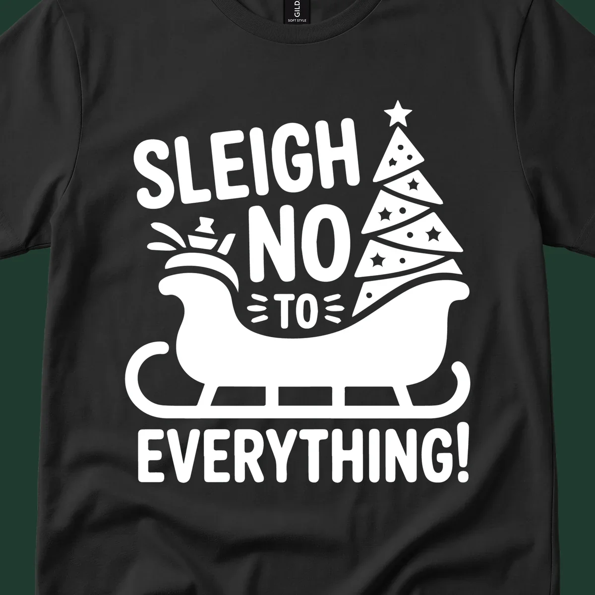 Sleigh no to everything graphic with christmas tree in sleigh.