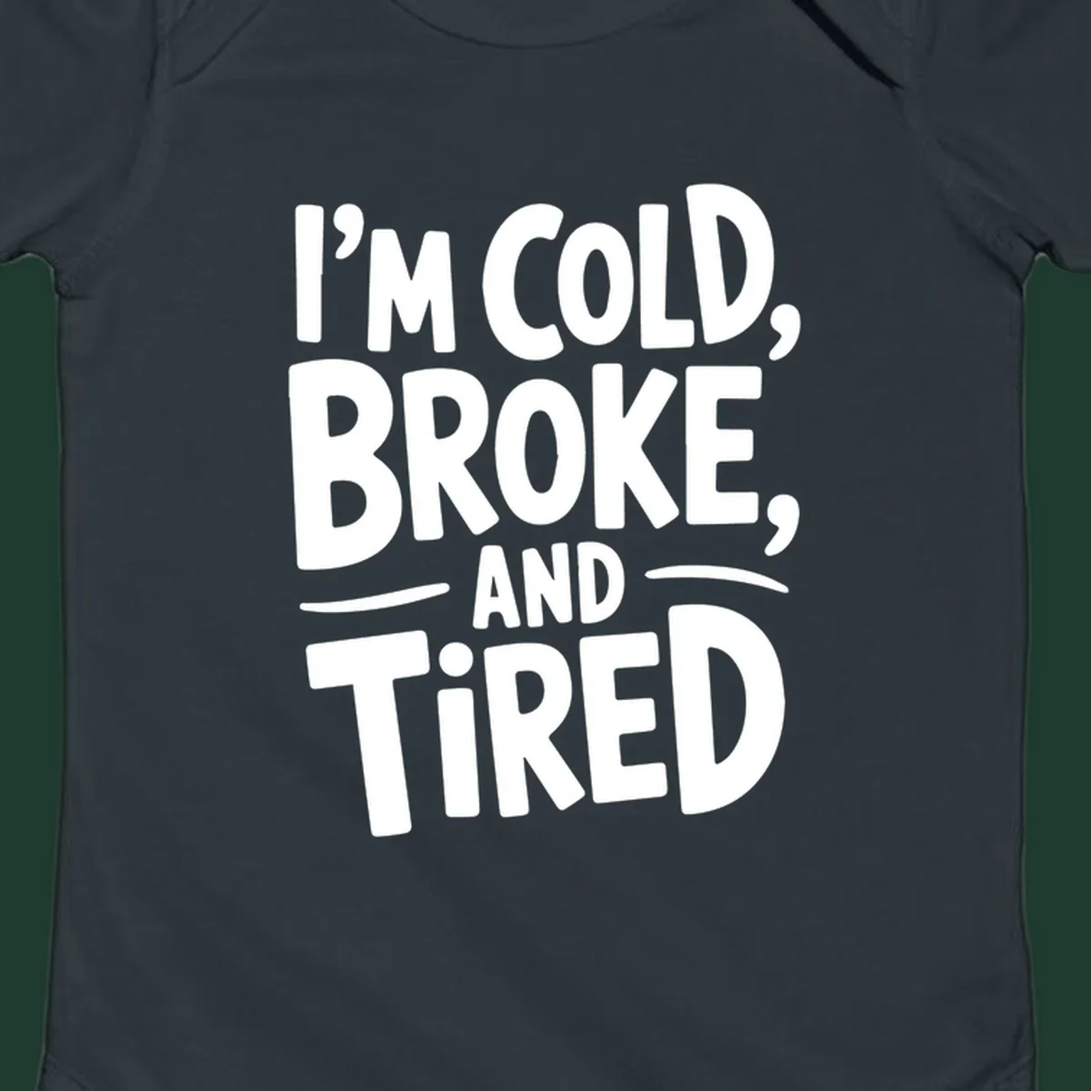 White typography stating "I'm Cold, Broke, And Tired" on a dark background.