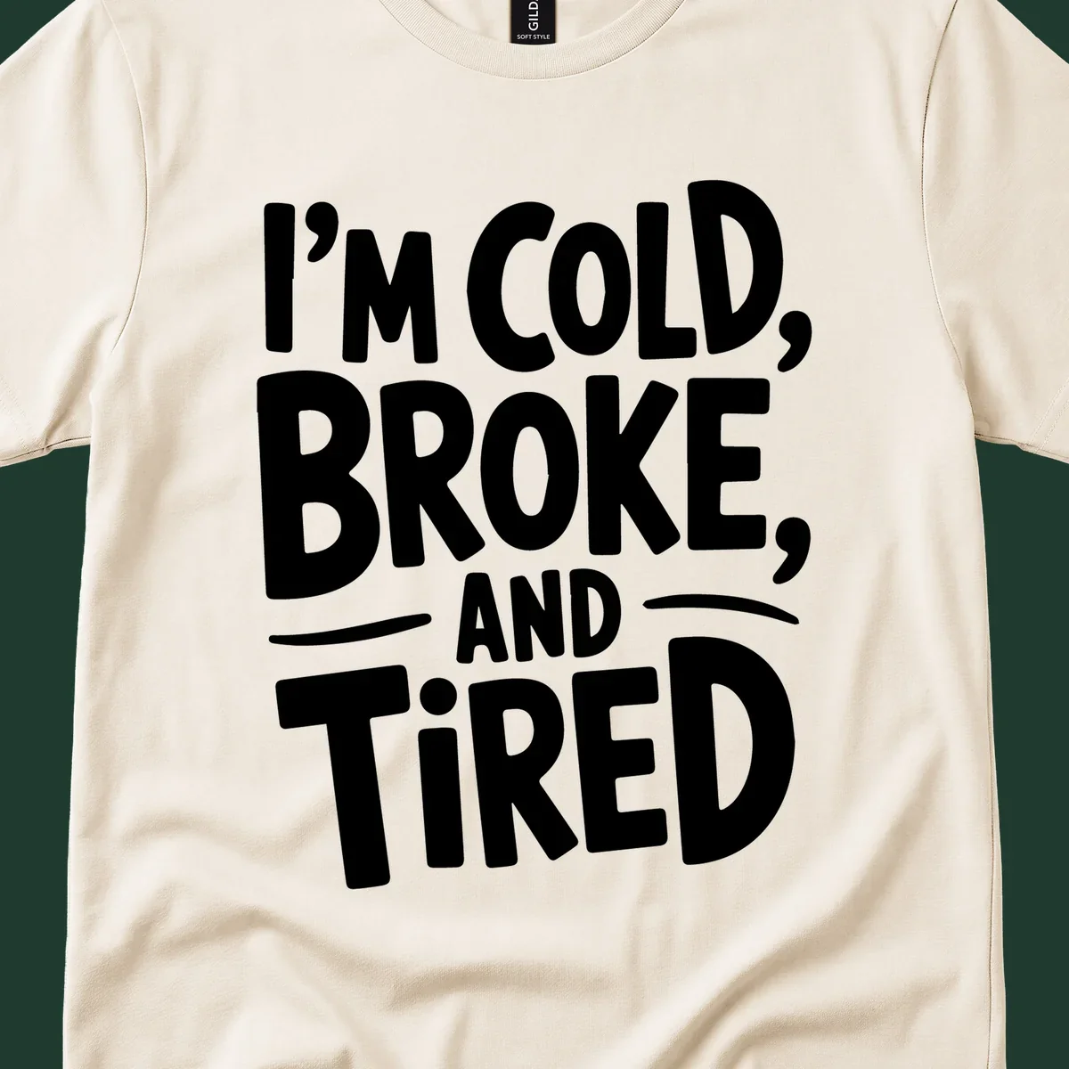 White typography stating "I'm Cold, Broke, And Tired" on a dark background.