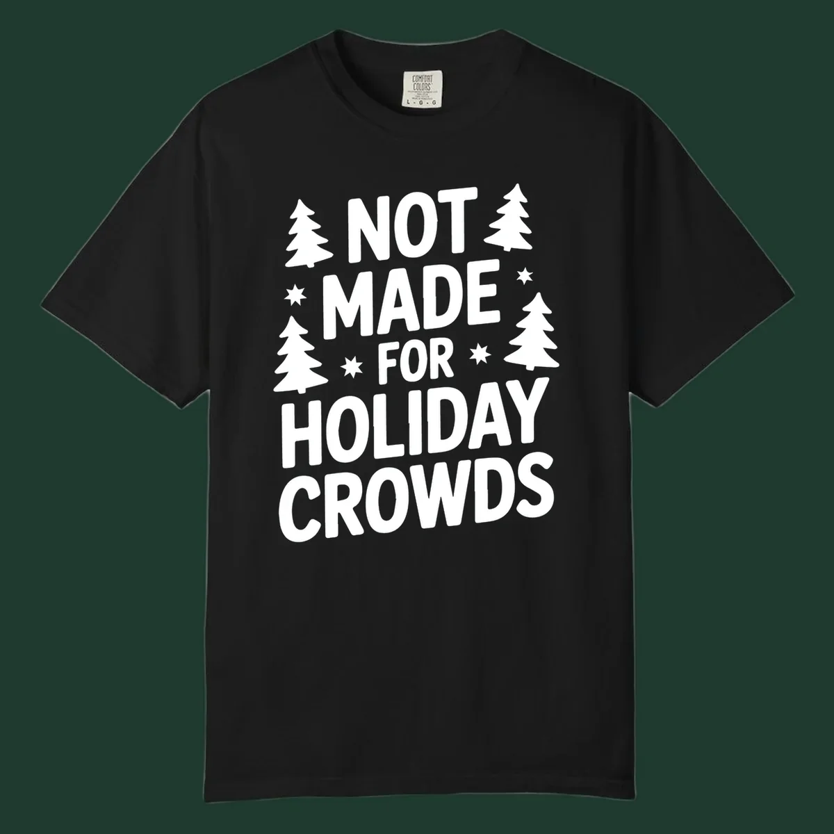 Typography design with 'NOT MADE FOR HOLIDAY CROWDS' text, Christmas trees, and stars.
