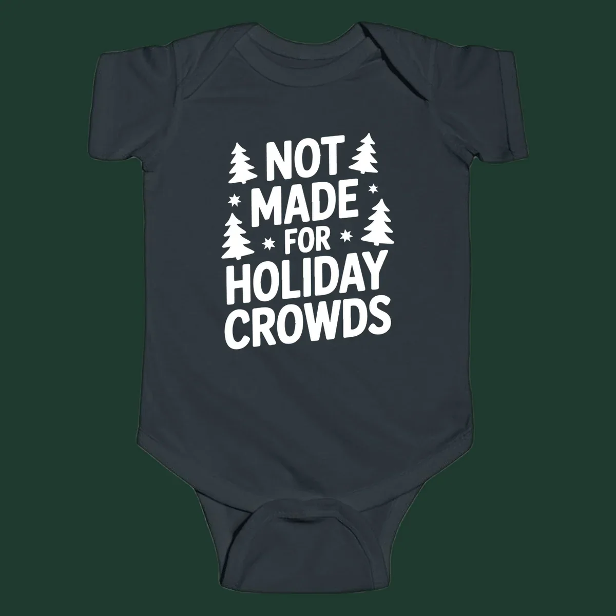 Typography design with 'NOT MADE FOR HOLIDAY CROWDS' text, Christmas trees, and stars.