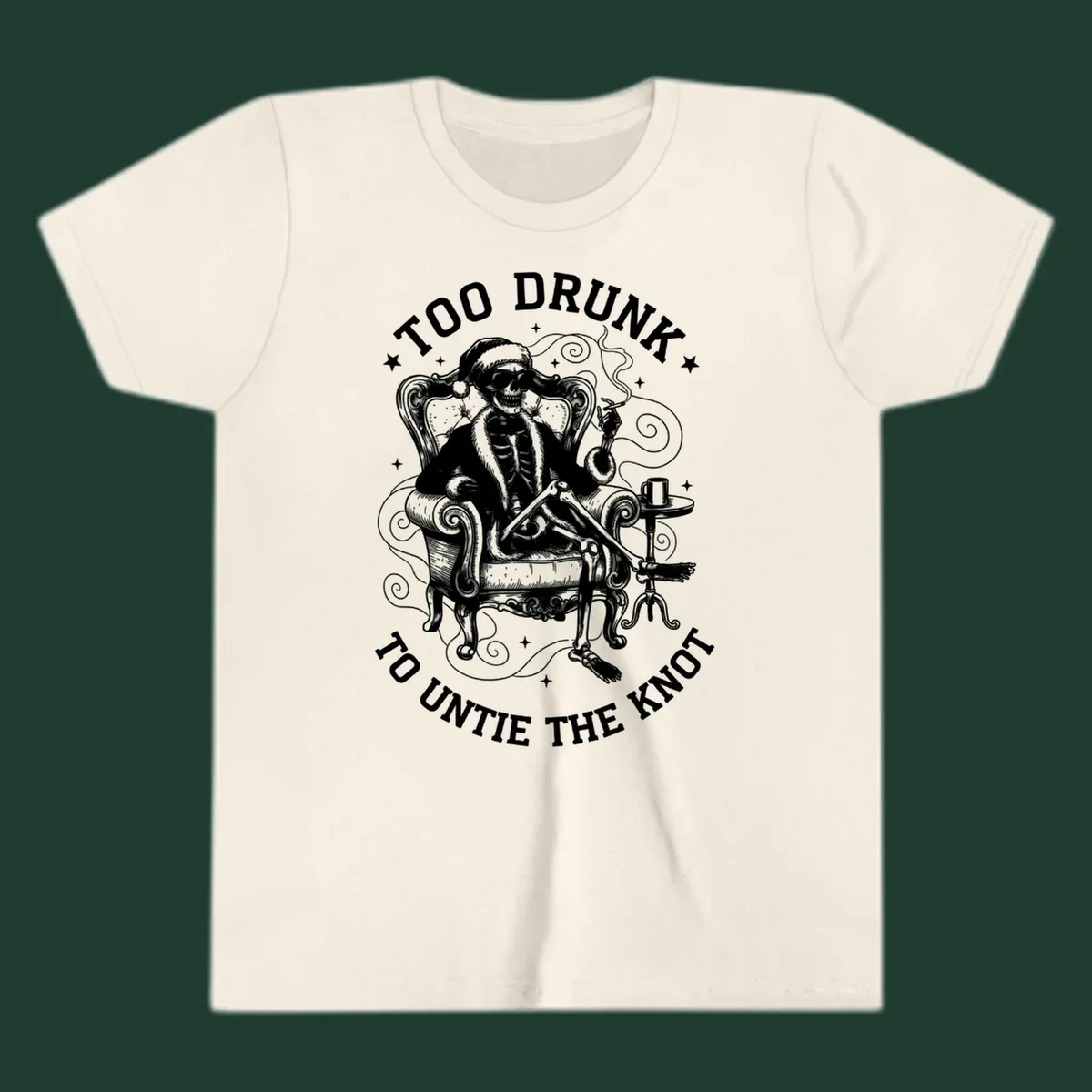 Drunk christmas skeleton in armchair, smoking, with text. Dark garment variant.