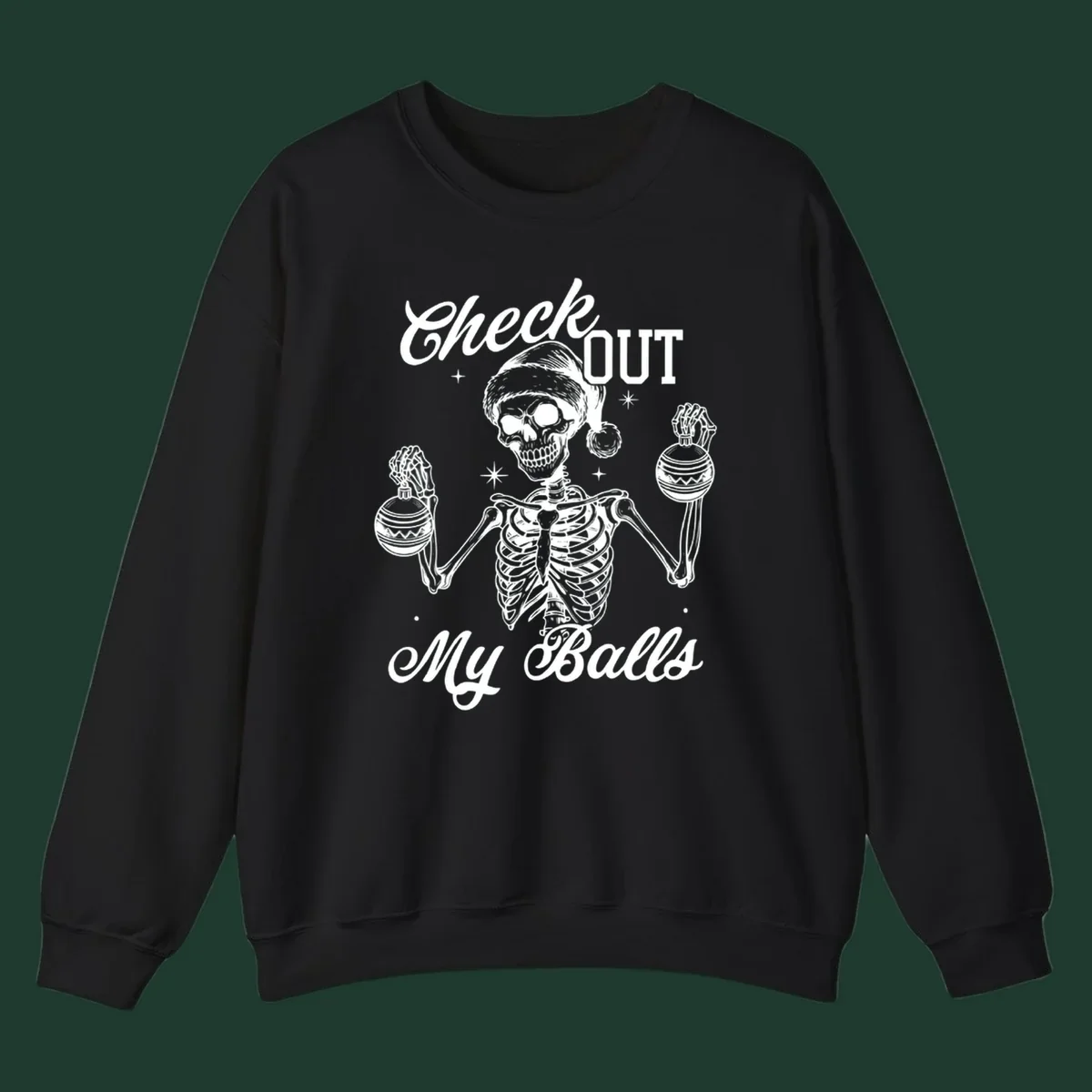 Skeleton wearing a Santa hat and holding Christmas ornaments, with text 'Check OUT My Balls'.