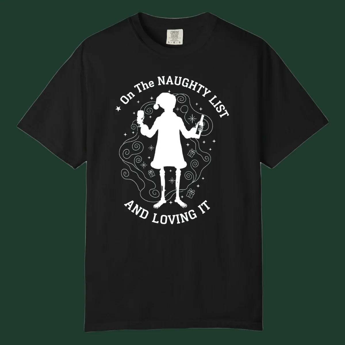Silhouette of person in Santa hat holding wine, text 'Naughty List And Loving It'.