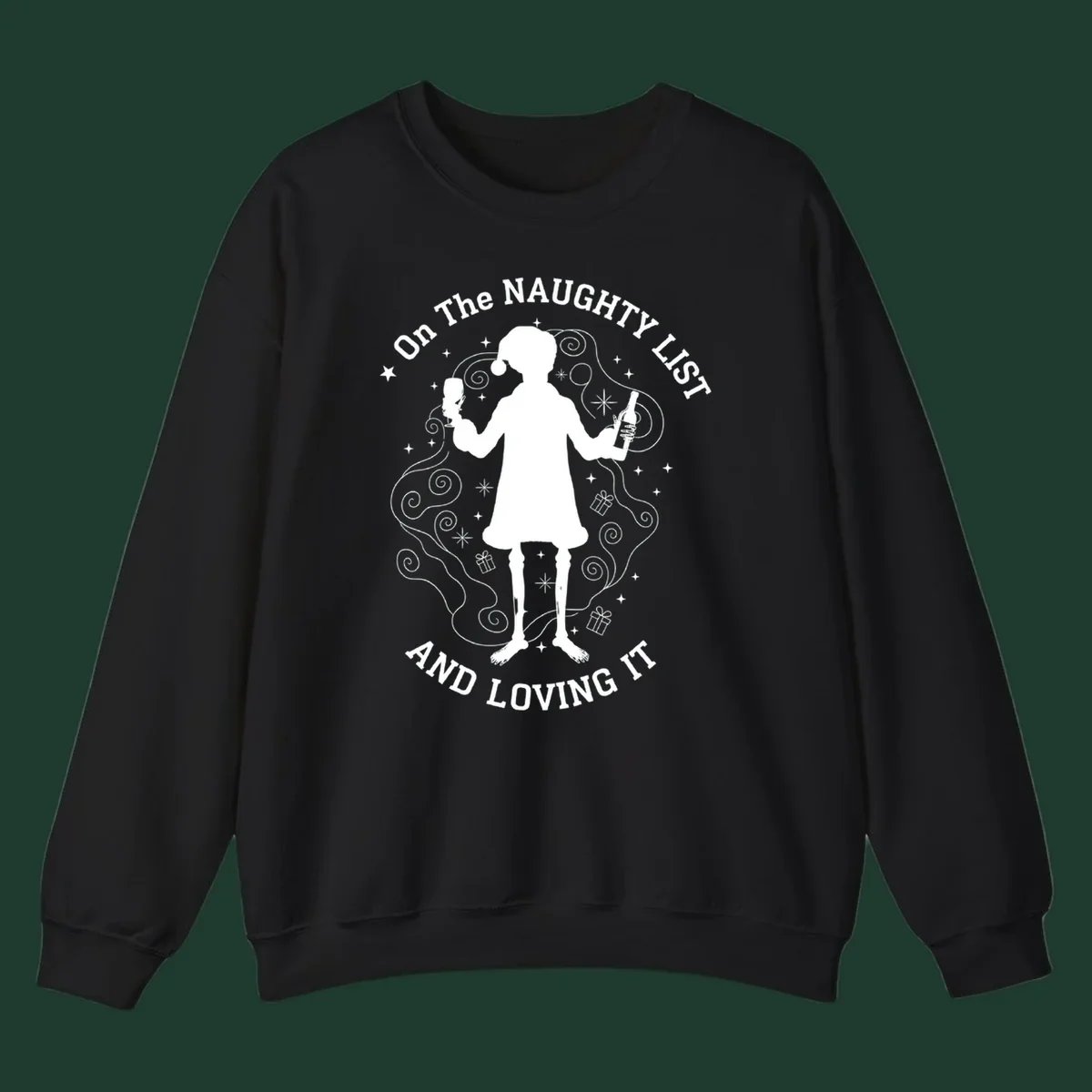 Silhouette of person in Santa hat holding wine, text 'Naughty List And Loving It'.