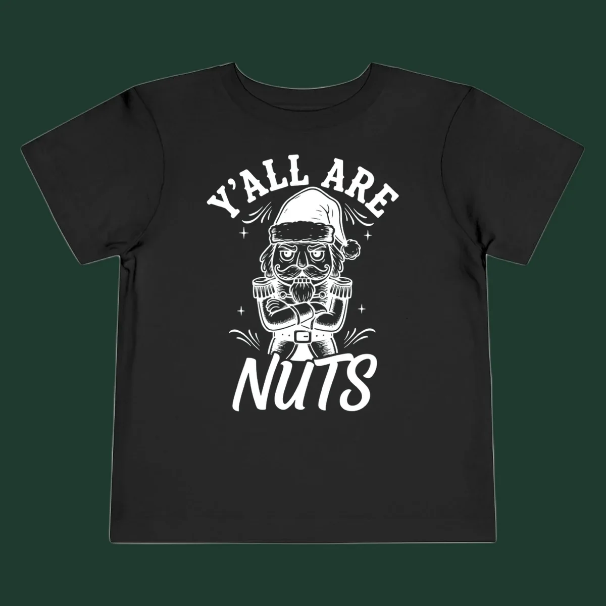 Nutcracker illustration with 'Y'ALL ARE NUTS' text, a holiday graphic.