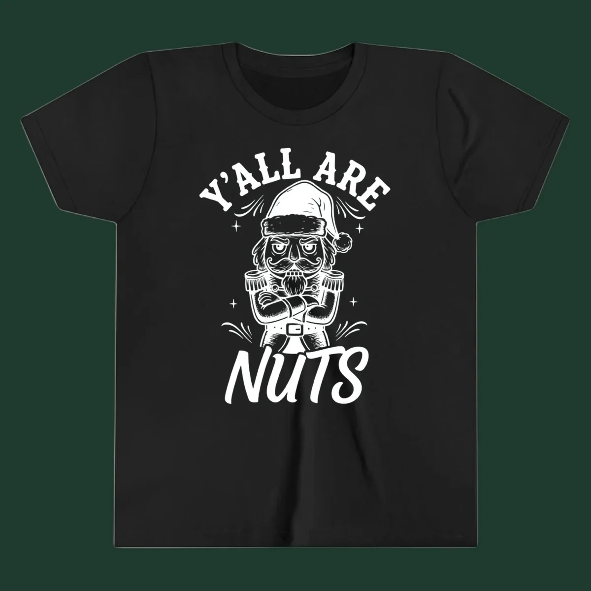Nutcracker illustration with 'Y'ALL ARE NUTS' text, a holiday graphic.