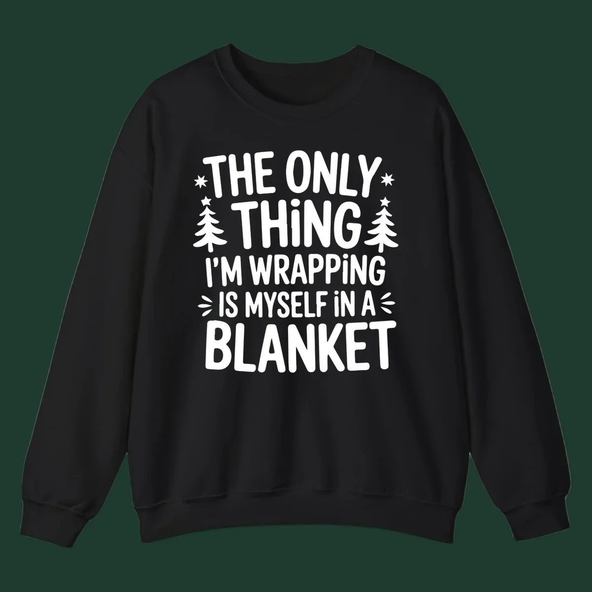The Only Thing I'm Wrapping Is Myself In A Blanket text design with stars and Christmas trees.