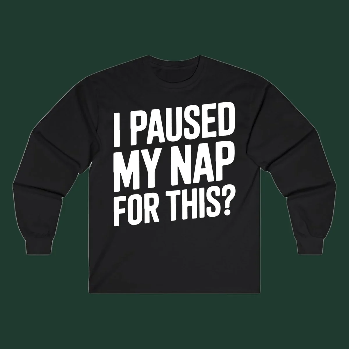 White typography quote 'I PAUSED MY NAP FOR THIS?' on a black background.