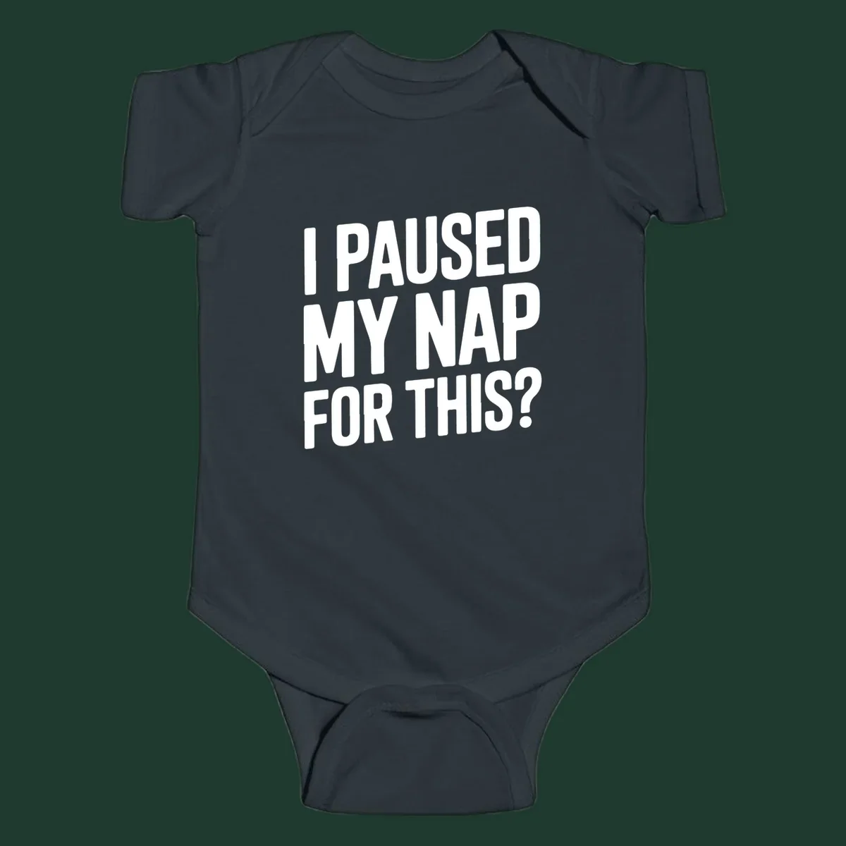 White typography quote 'I PAUSED MY NAP FOR THIS?' on a black background.