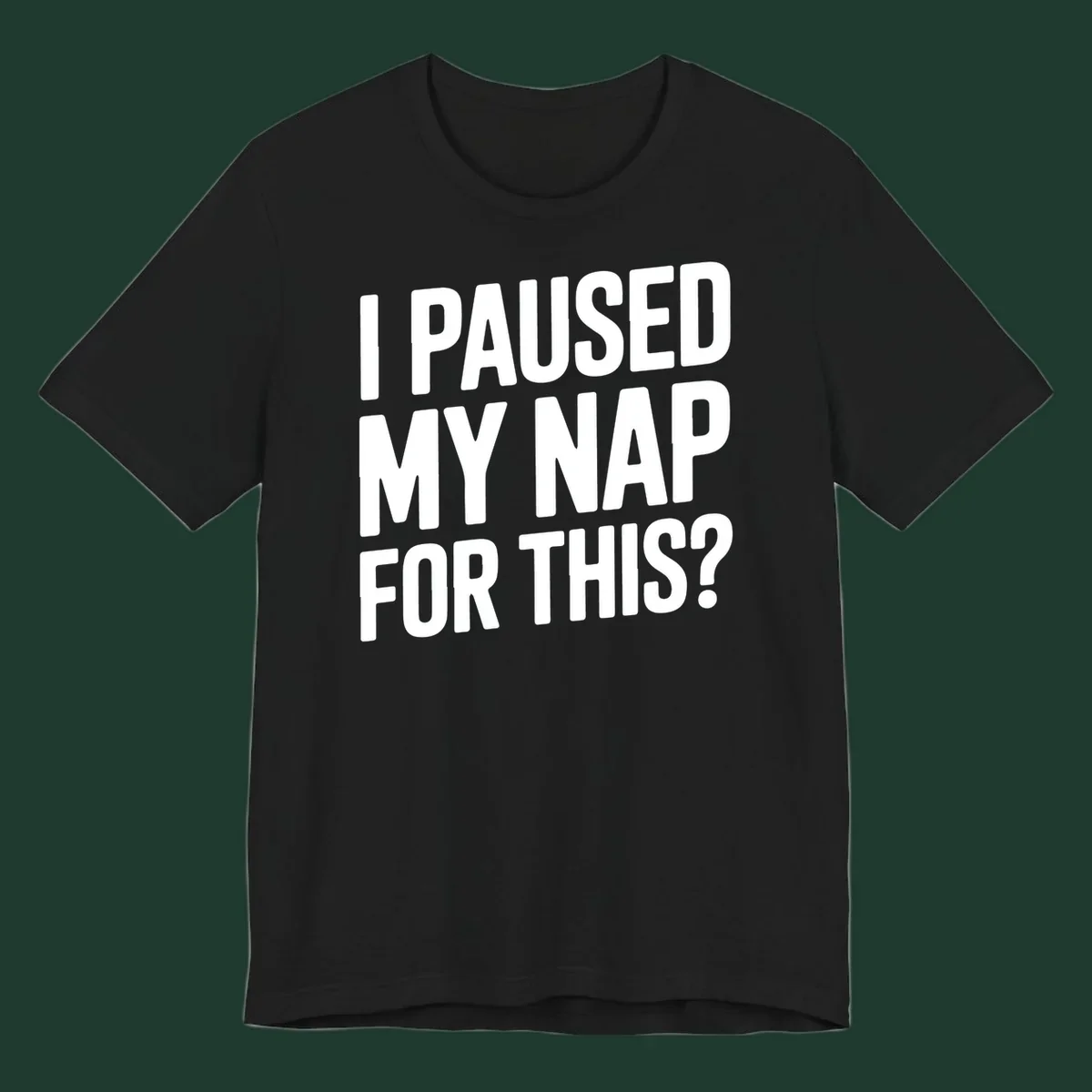 White typography quote 'I PAUSED MY NAP FOR THIS?' on a black background.