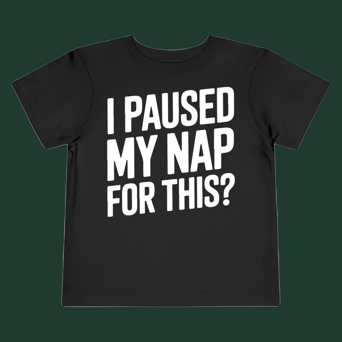 White typography quote 'I PAUSED MY NAP FOR THIS?' on a black background.