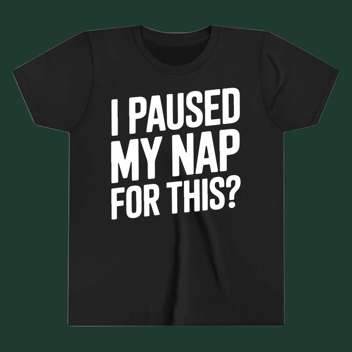 White typography quote 'I PAUSED MY NAP FOR THIS?' on a black background.