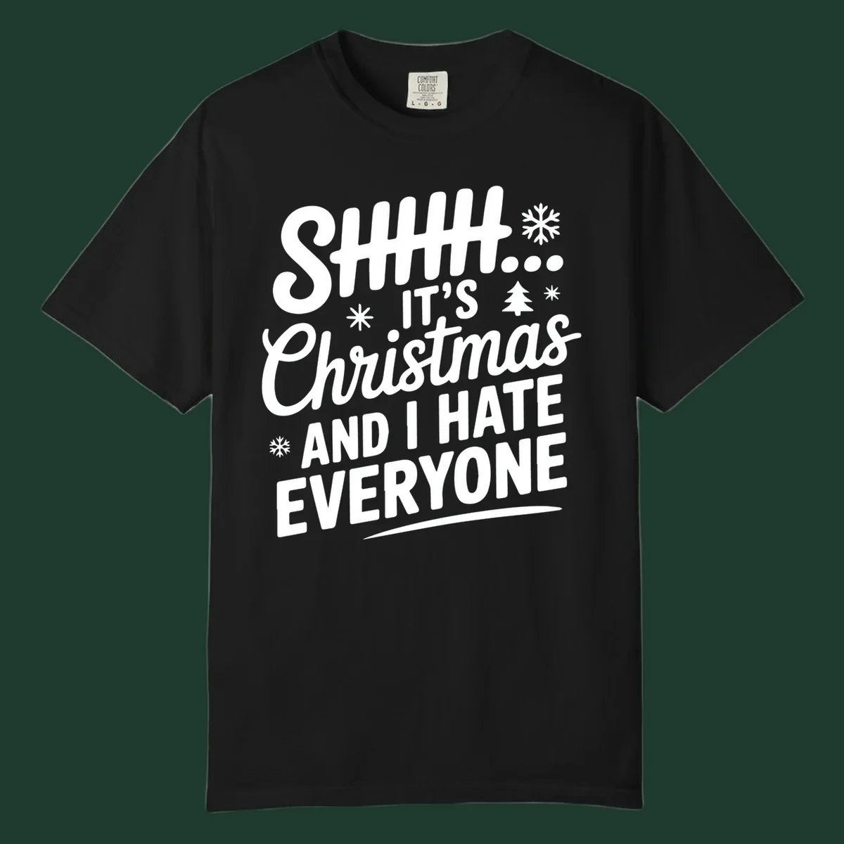 Shhh It's Christmas And I Hate Everyone text design with snowflake and tree graphics.