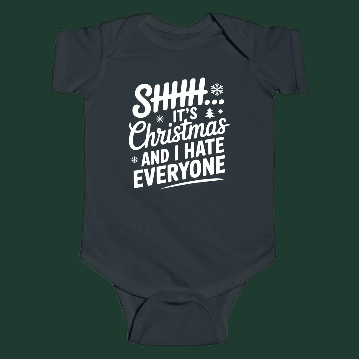 Shhh It's Christmas And I Hate Everyone text design with snowflake and tree graphics.