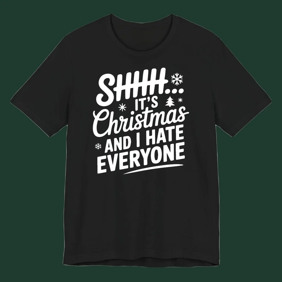 Shhh It's Christmas And I Hate Everyone text design with snowflake and tree graphics.