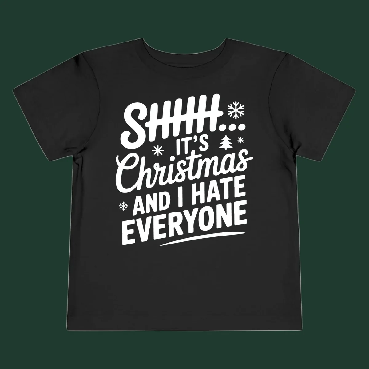 Shhh It's Christmas And I Hate Everyone text design with snowflake and tree graphics.