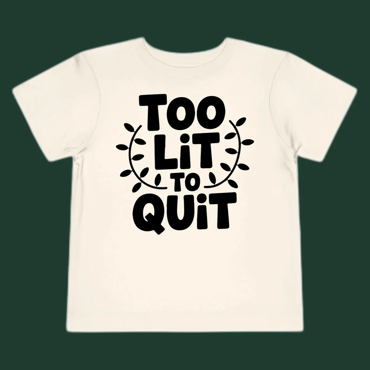 Too Lit To Quit phrase with leafy branches graphic.