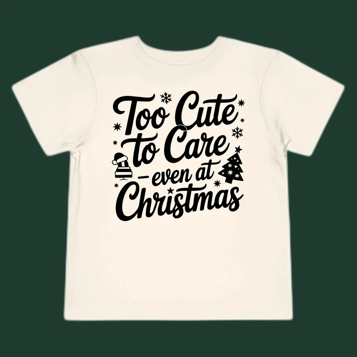White text design 'Too Cute to Care - even at Christmas' with snowflakes, a tree, and Santa hat.